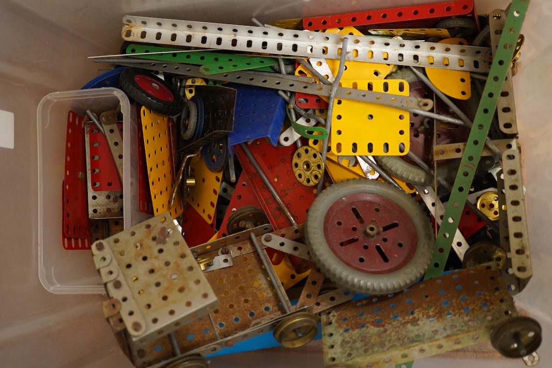 A large quantity of early Meccano construction parts, including a variety of specialist parts from the earliest sets produced and the original box for set No.3